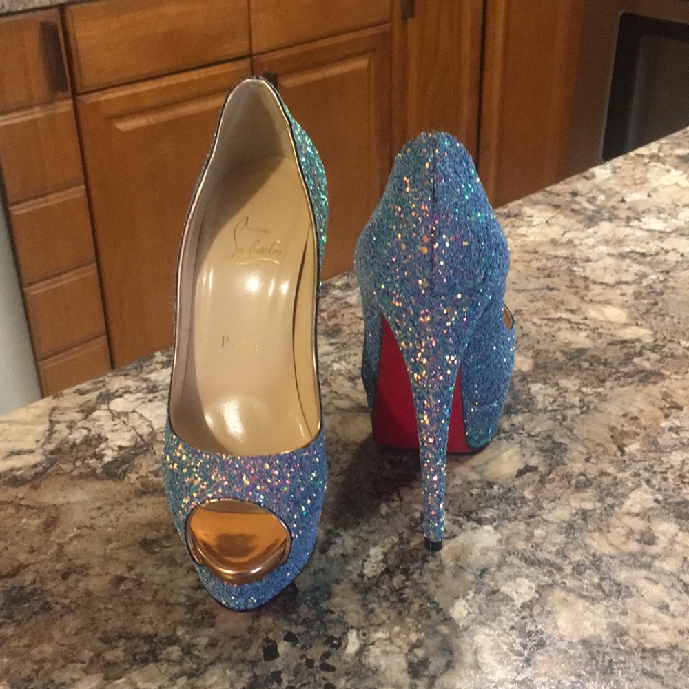 Christian Louboutin (Red Bottoms)